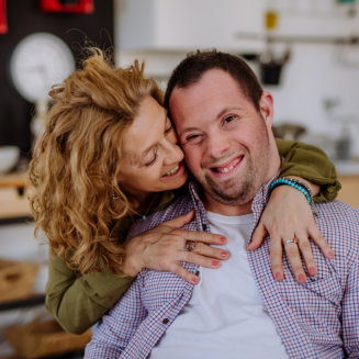 woman and a man smiling together