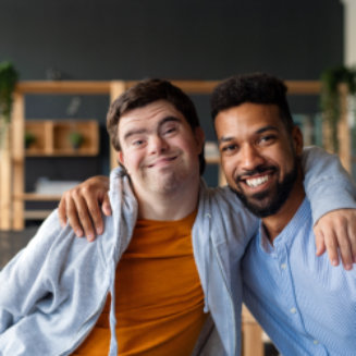 two men smiling together