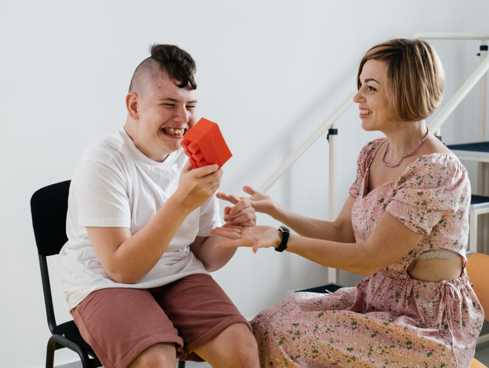 boy holding a lego block